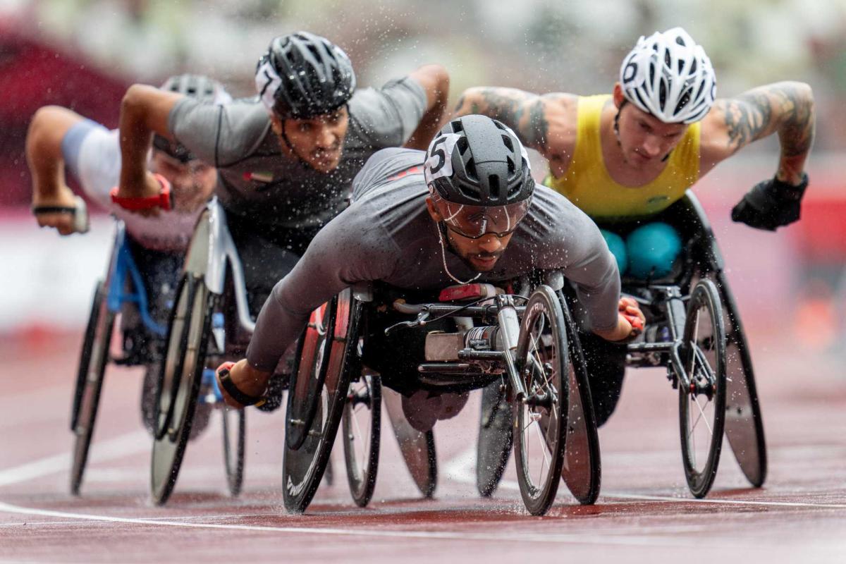 Wheelchair racers in action